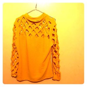 A mustard yellow top